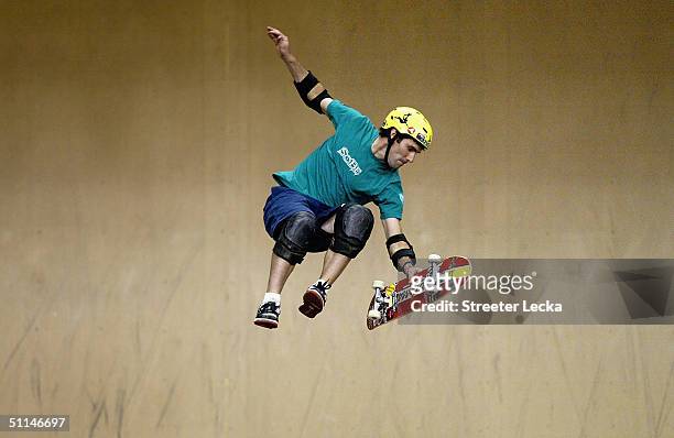 Andy MacDonald competes in the men's skateboard competition during the ESPN X-Games on August 5, 2004 at the Staples Center in Los Angeles,...