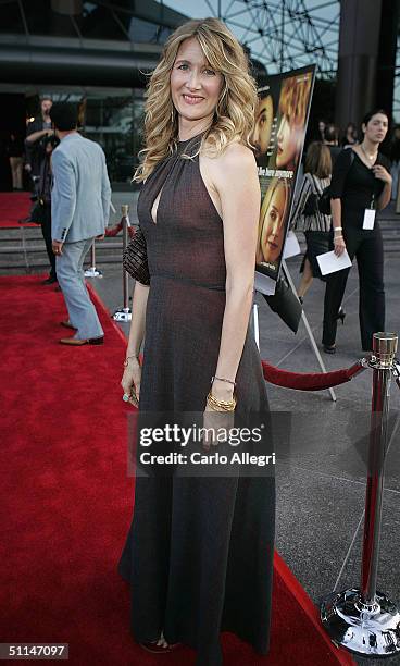 Actress Laura Dern arrives at the Premiere of "We Don't Live Here Anymore" at the Director's Guild Theatre on August 5, 2004 in Los Angeles,...