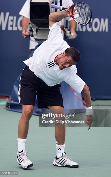 Marat Safin of Russia slams his racket in frustration playing Lleyton Hewitt of Australia during the Western and Southern Financial Group Masters...