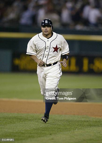 Ivan Rodriguez of the Detroit Tigers jogs off the field during the game against the Chicago White Sox on July 31, 2004 in Detroit, Michigan. The...