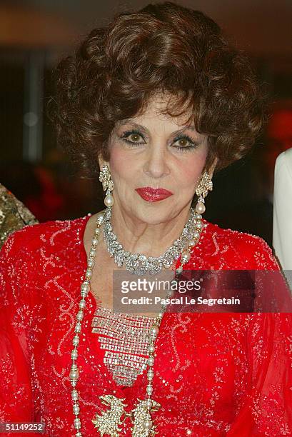 Italian actress Gina Lollobrigida arrives at the Monte Carlo Red Cross Ball 2004 held at the Salle des Etoiles of the Monaco Sporting Club on August...