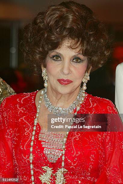 Italian actress Gina Lollobrigida arrives at the Monte Carlo Red Cross Ball 2004 held at the Salle des Etoiles of the Monaco Sporting Club on August...