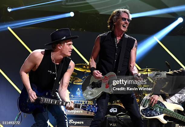 Recording artists Cody Simpson and Rick Springfield perform onstage during the first ever iHeart80s Party at The Forum on February 20, 2016 in...
