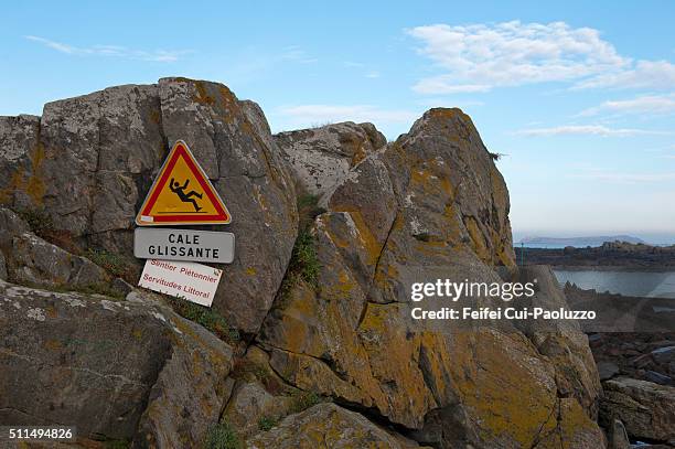 warming sign at trédrez-locquémeau côtes-d'armor department brittany region france - slippery road sign stock pictures, royalty-free photos & images