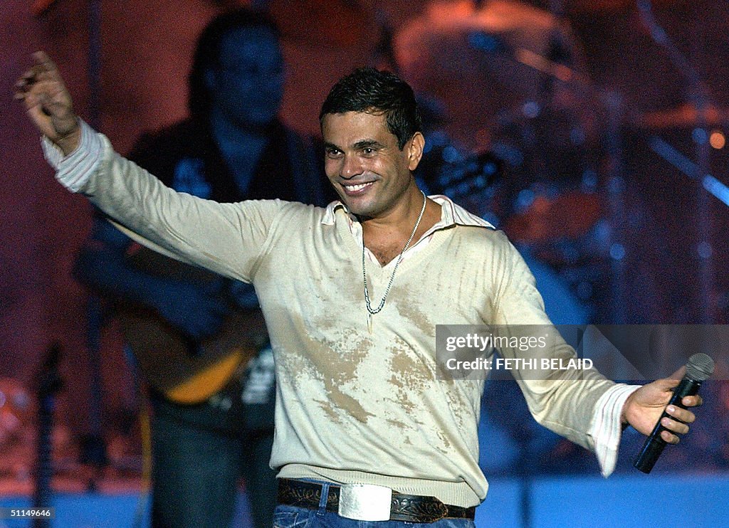 Amro Rabi Egyptian singer Amro Diab performs late 06 August 2004 during the ...
