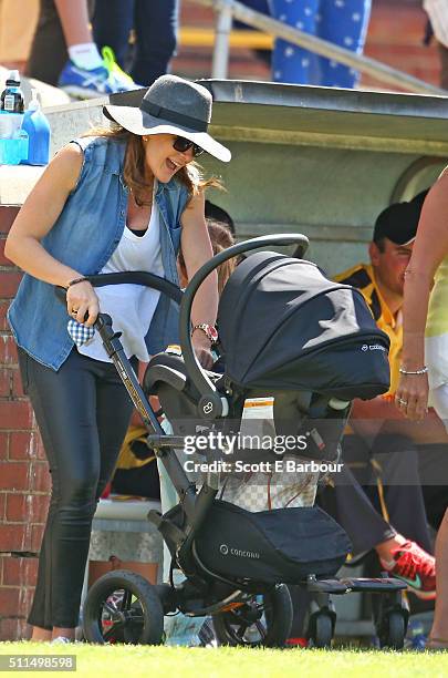 Michelle Bridges with her baby Axel in his pram during the Medibank Melbourne Celebrity Twenty20 match at North Port Oval on February 21, 2016 in...