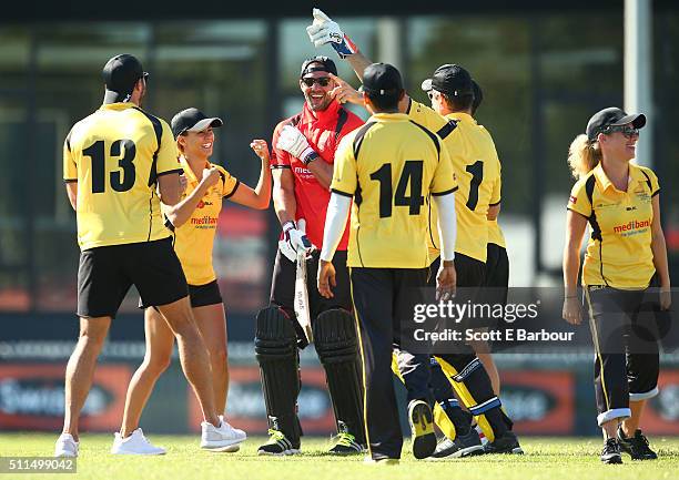 Kris Smith leaves the field after being dismissed as Glen Moriarty, Lauren Phillips, Sam Wood and Ash Pollard gesture towards him during the Medibank...