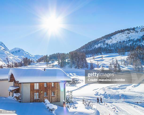 traditional chalet in engadin, switzerland - alpine lodge stock-fotos und bilder