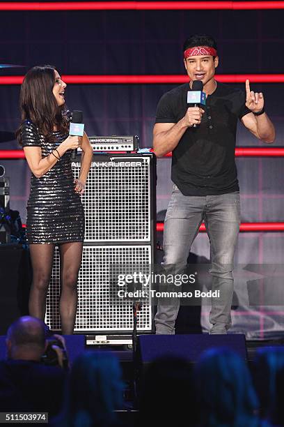 Personalities Martha Quinn and Mario Lopez speak onstage during the iHeart80s Party 2016 at The Forum on February 20, 2016 in Inglewood, California.
