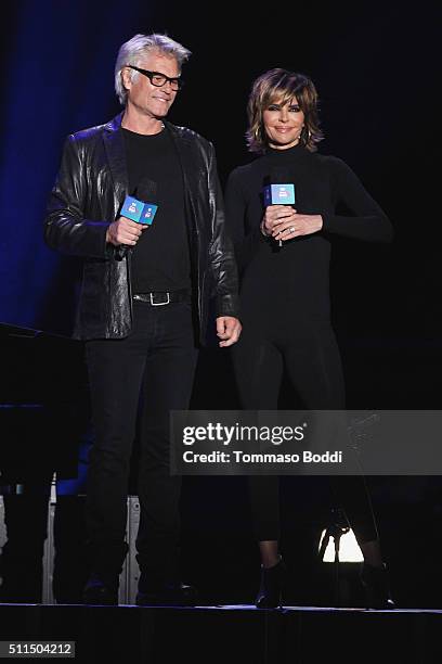Actors Harry Hamlin and Lisa Rinna on stage during the iHeart80s Party 2016 at The Forum on February 20, 2016 in Inglewood, California.