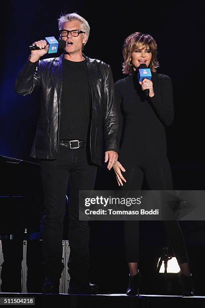 Actors Harry Hamlin and Lisa Rinna on stage during the iHeart80s Party 2016 at The Forum on February 20, 2016 in Inglewood, California.