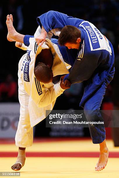 Benjamin Fletcher of Great Britain and Jose Armenteros of Cuba compete during the Dusseldorf Judo Grand Prix in their Mens -100kg bout held at...