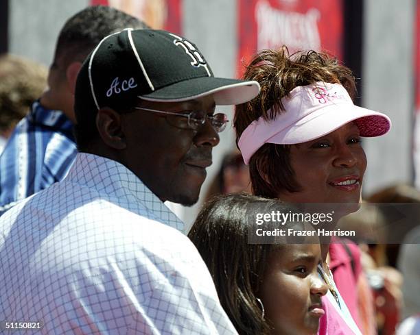 Actress/singer Whitney Houston and husband Bobby Brown arrives at The Princess Diaries 2: Royal Engagement Premiere held at Downtown Disneyland e on...