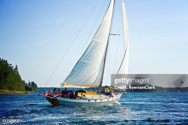 family sailing on mahone bay, nova scotia - boating stock pictures, royalty-free photos & images