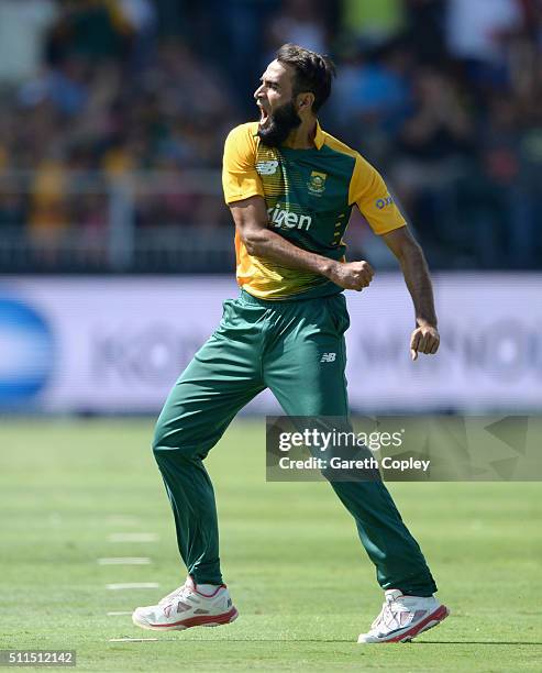 Imran Tahir of South Africa celebrates dismissing Joe Root of England during the 2nd KFC T20 International match between South Africa and England at...