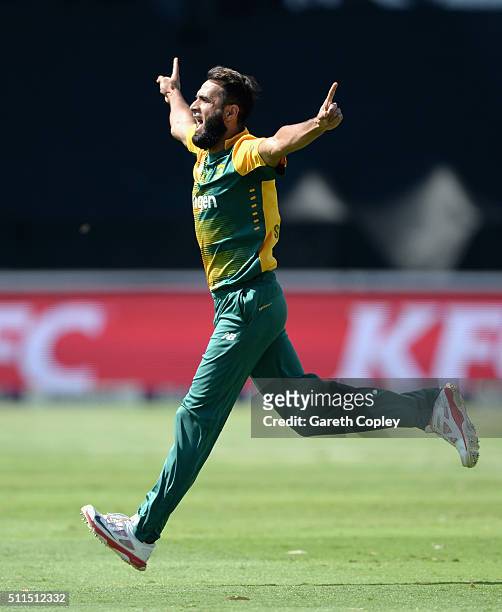 Imran Tahir of South Africa celebrates dismissing Joe Root of England during the 2nd KFC T20 International match between South Africa and England at...