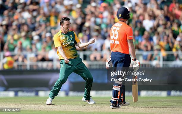 Kyle Abbott of South Africa celebrates dismissing England captain Eoin Morgan during the 2nd KFC T20 International match between South Africa and...