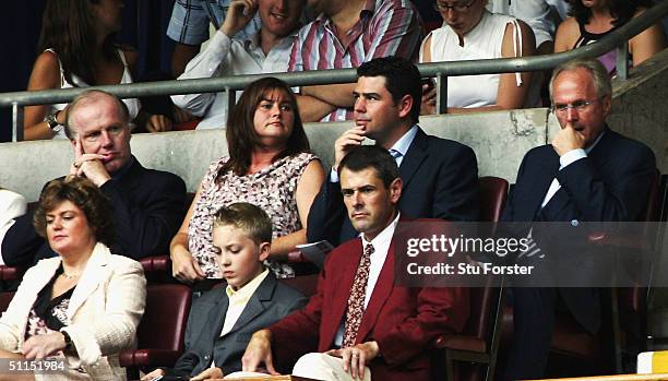 England coach Sven Goran Eriksson and David Davies look on during the FA Community shield match between Arsenal and Manchester United at the...