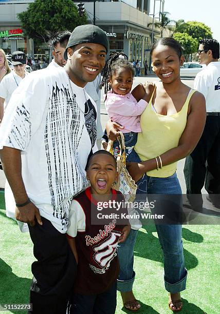 Actor Kel Mitchell , wife, Tyisha, and their children arrive for the premiere of Warner Bros. "Yu-Gi-Oh! The Movie" at the Chinese Theater August 7,...