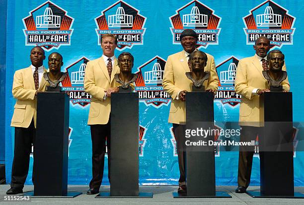 Pro Football Hall of Fame enshrinees Barry Sanders of the Detroit Lions, John Elway of the Denver Broncos, Carl Eller of the Minnesota Vikings and...