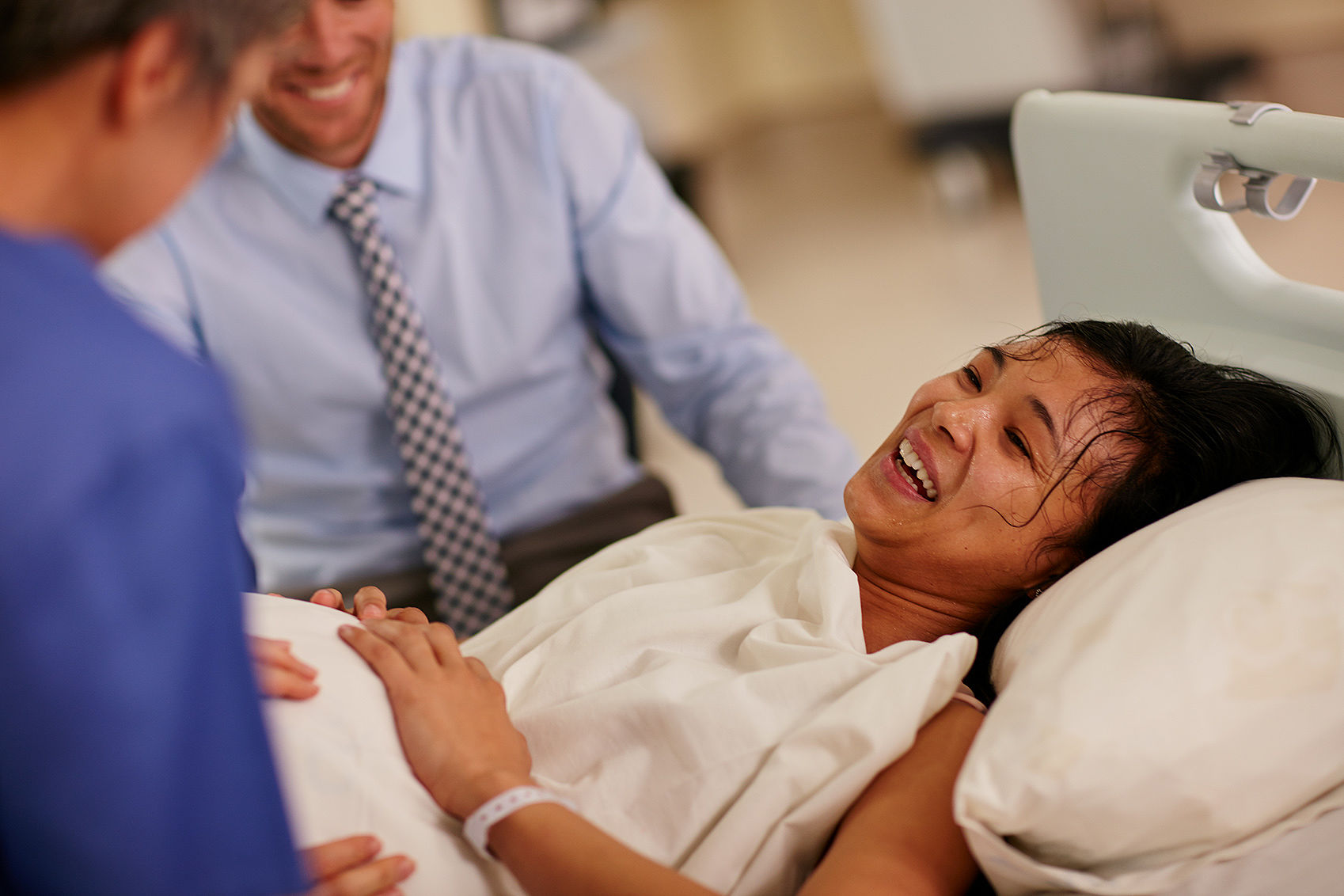woman undergoing mammogram