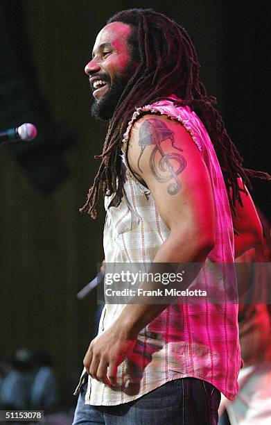 Kymani Marley, son of Bob Marley, performs onstage at the "Roots, Rock, Reggae Tour 2004" at the Filene Center August 8, 2004 in Vienna, Virginia