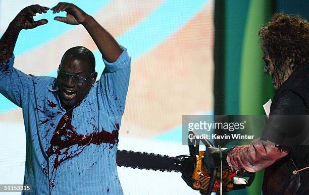 Leatherface attacks "American Idol's" Randy Jackson with a chainsaw on stage at The 2004 Teen Choice Awards held on August 8, 2004 at Universal...