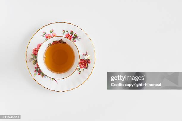 vintage tea cup and saucer - cup of tea from above stock pictures, royalty-free photos & images