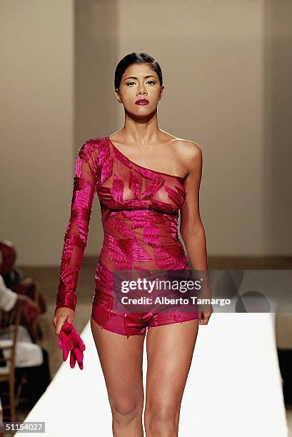 Model walks the catwalk at the new Sylvia Tcherassi collection at The Mir Foundation Fashion Show and Gala At La Romana, on August 8, 2004 at Casa De...