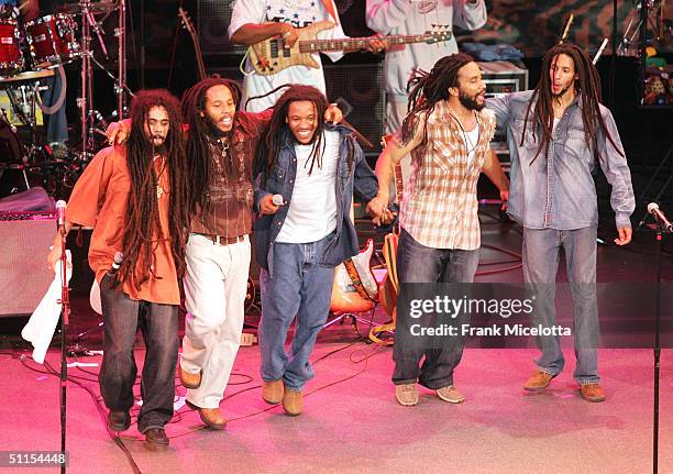 Damian, Ziggy, Stephen, Kymani and Julian Marley, sons of Bob Marley, perform onstage at the "Roots, Rock, Reggae Tour 2004" at the Filene Center...