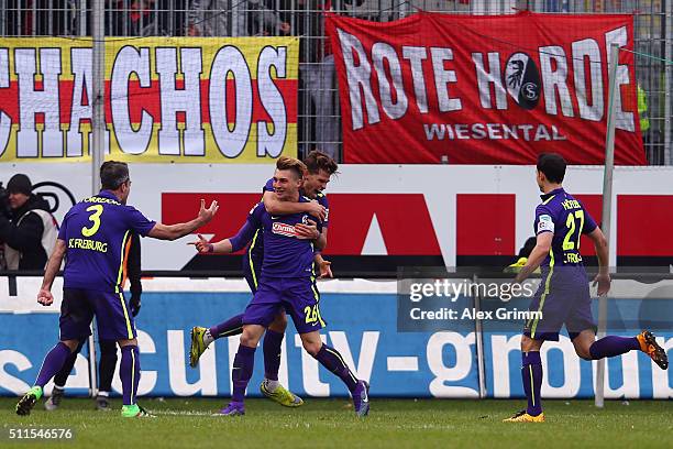 Maximilian Philipp of Freiburg celebrates his team's first goal with team mates during the Second Bundesliga match between SV Sandhausen and SC...