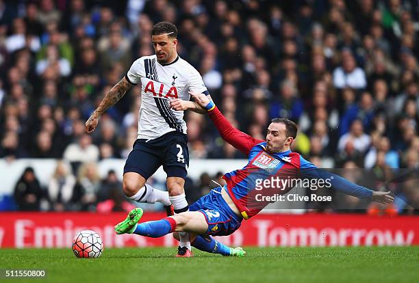 Kyle Walker of Tottenham Hotspur is challenged by Jordon Mutch of Crystal Palace during the Emirates FA Cup Fifth Round match between Tottenham...