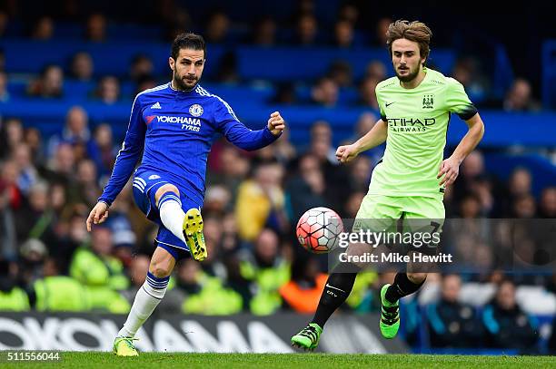 Cesc Fabregas of Chelsea passes as Aleix Garcia Serrano of Manchester City closes in during The Emirates FA Cup fifth round match between Chelsea and...