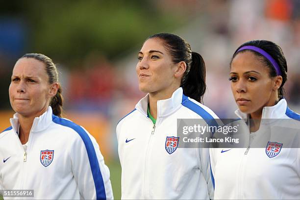 Christie Rampone, Hope Solo and Sydney Leroux of the U.S. Women's national team look on prior to their match against the Swiss women's national team...