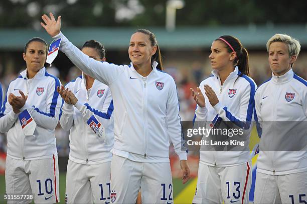 Lauren Holiday of the U.S. Women's national team waves to fans prior to their match against the Swiss women's national team at WakeMed Soccer Park on...