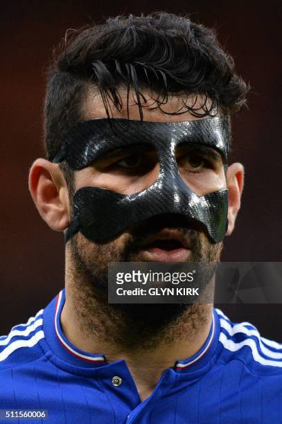 Chelsea's Brazilian-born Spanish striker Diego Costa wears a protective face mask as he plays during the English FA Cup fifth round football match...
