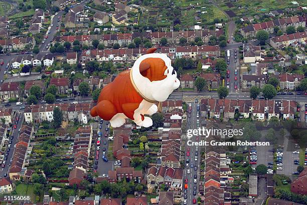 Hot air balloon rises over Bristol city centre, August 10, 2004 Bristol, England. The Balloons took to the sky as a precursor to the annual Bristol...