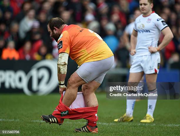 Peter Edwards of Scarlets is forced to change his shorts during the Guinness PRO12 game between Ulster and Scarlets at Kingspan Stadium on February...