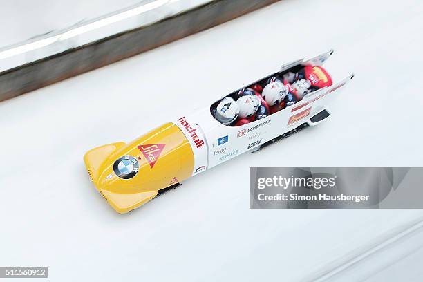 Rico Peter, Janne van der Zijde, Thomas Amrhein and Simon Friedli of Switzerland in action during the Mens Four-Man Bobsleigh at Day 7 of the IBSF...