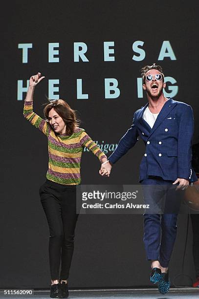 Spanish designer Teresa Helbig and singer Aldo Comas walk the runway at the Teresa Helbig show during the Mercedes-Benz Madrid Fashion Week...