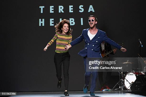 Spanish designer Teresa Helbig and singer Aldo Comas walk the runway at the Teresa Helbig show during the Mercedes-Benz Madrid Fashion Week...