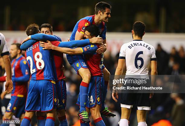 Martin Kelly of Crystal Palace celebrates with Scott Dann of Crystal Palace after the Emirates FA Cup Fifth Round match between Tottenham Hotspur and...