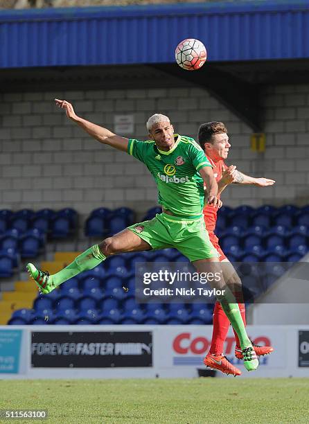 Joe Maguire of Liverpool and Maikael Mandron of Sunderland in action during the Liverpool v Sunderland Barclays U21 Premier League game at the...