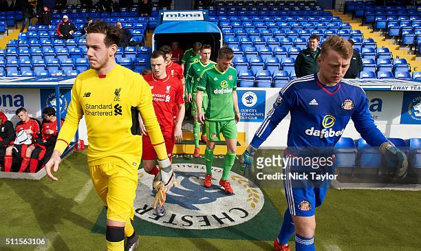 Goalkeepers Daniel Ward of Liverpool and James Talbot of Sunderland kae their way onto the pitch at the start of the Liverpool v Sunderland Barclays...