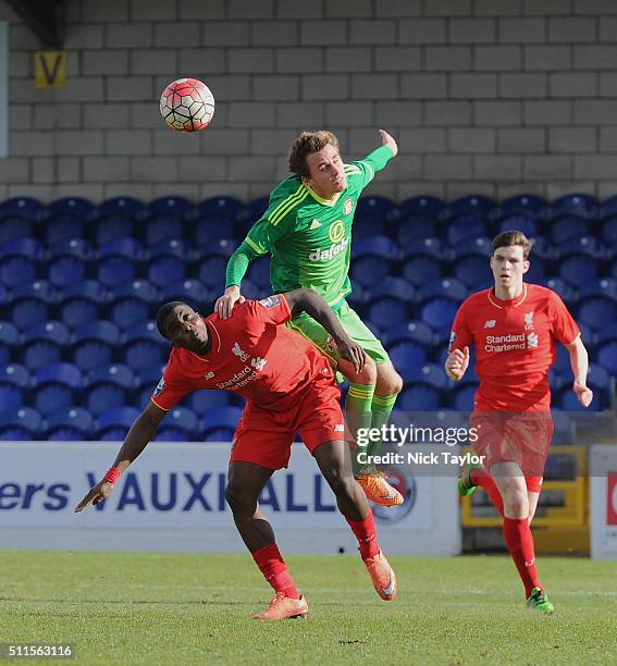 Sheyi Ojo of Liverpool and Carl Lawson of Sunderland in action during the Liverpool v Sunderland Barclays U21 Premier League game at the Lookers...