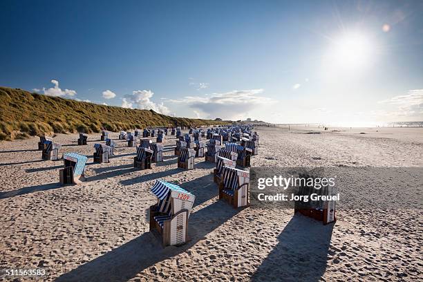 wicker beach chairs - norderney stock pictures, royalty-free photos & images