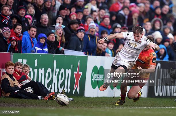 Craig Gilroy of Ulster desperately attempts to keep the ball in play during the Guinness PRO12 game between Ulster and Scarlets at Kingspan Stadium...