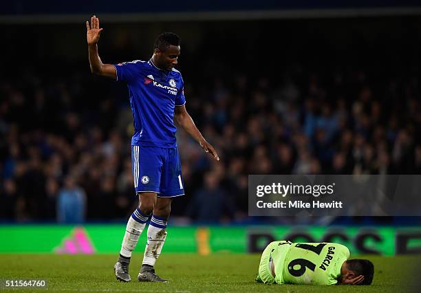 John Mikel Obi of Chelsea reacts after a collision with Manu Garcia Alonso of Manchester City during The Emirates FA Cup fifth round match between...