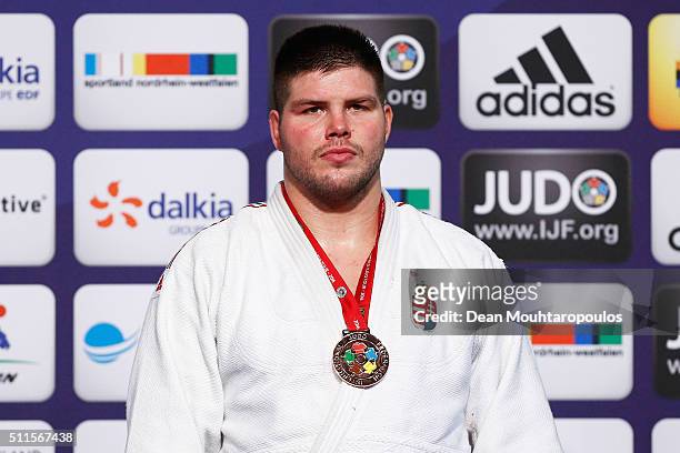 Barna Bor of Hungary poses after winning the bronze medal in the Mens +100kg during the Dusseldorf Judo Grand Prix held at Mitsubishi Electric Halle...
