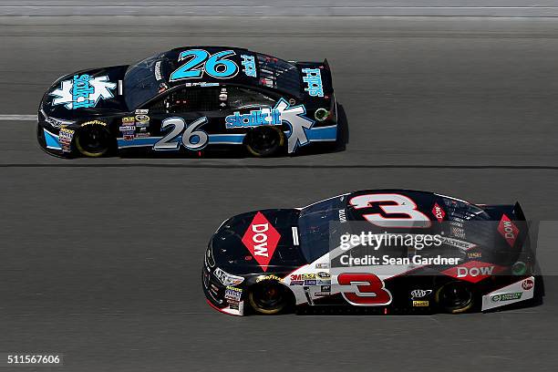 Robert Richardson Jr., driver of the Stalk It Toyota, races Austin Dillon, driver of the DOW Chevrolet, during the NASCAR Sprint Cup Series DAYTONA...